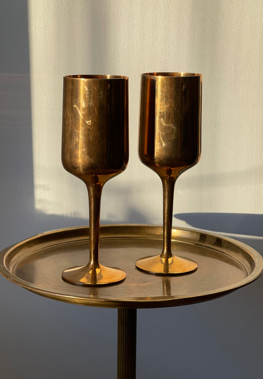 pair of brass chalices