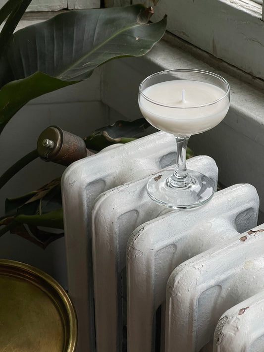 hand-crafted candle, with petite coupe glass