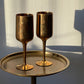 pair of brass chalices