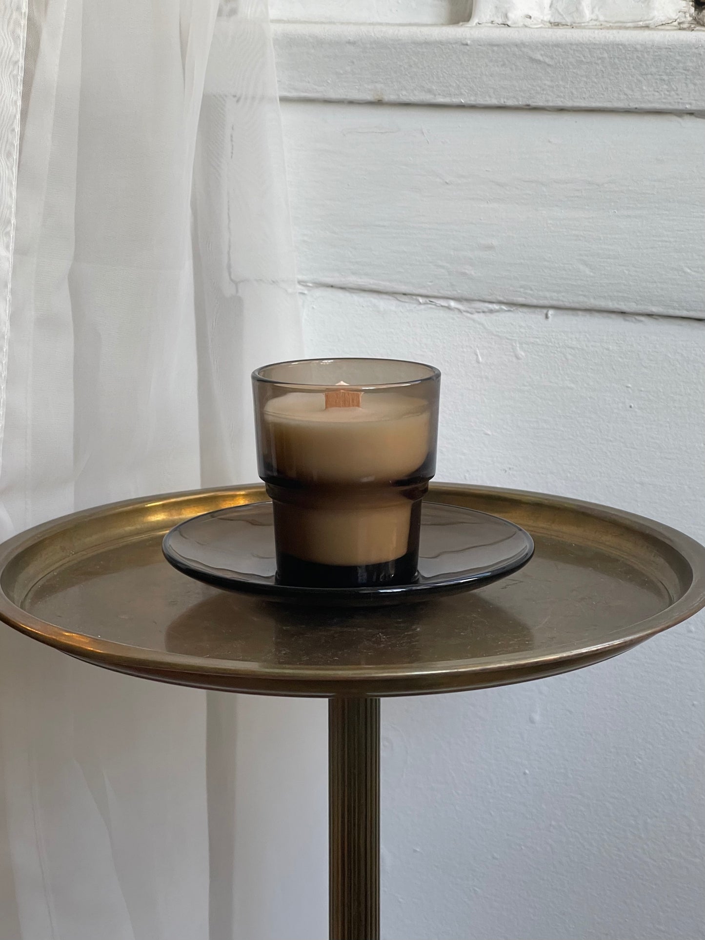 hand-crafted candle, w/ petite smoked glass + saucer